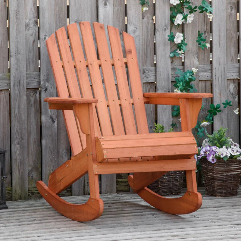 Adirondack Muskoka wooden rocking chair with wooden slat design, fan-shaped back and classic rustic style, teak -